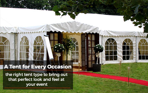 Large white tent setup with open doors and red carpet