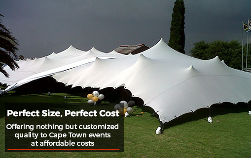 Custom stretch tents set up in a green outdoor area
