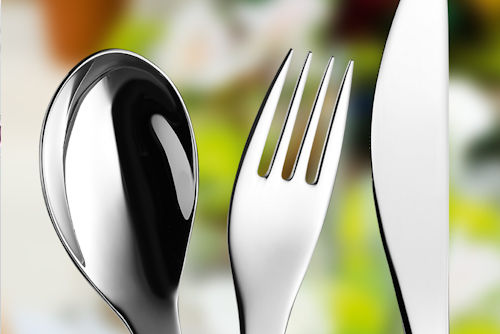 Polished stainless steel spoon, fork, and knife