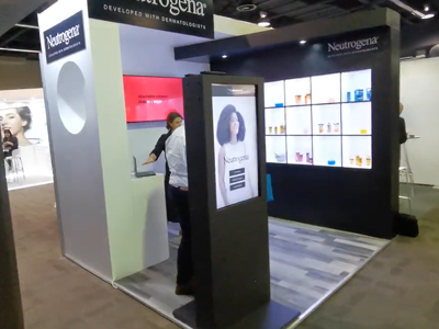 Neutrogena brand activation booth with product displays.