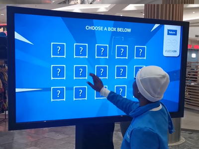 Large interactive touch screen display with game options