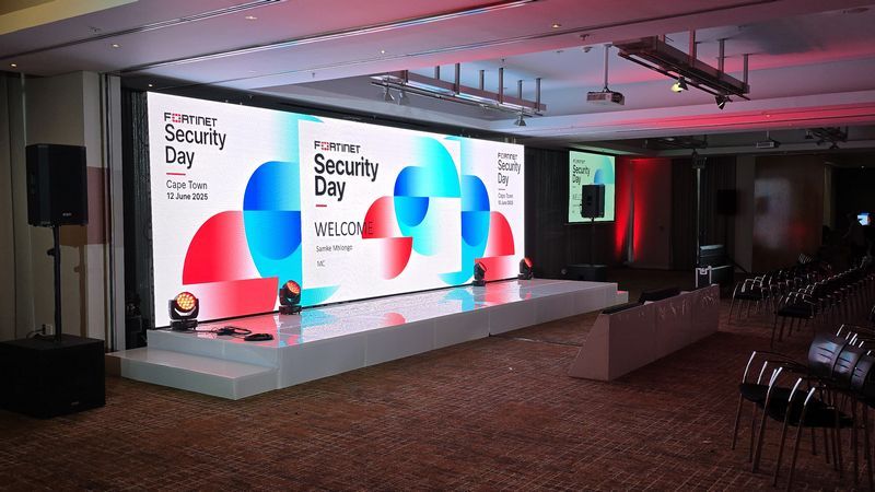 LED screen and stage setup for a corporate event