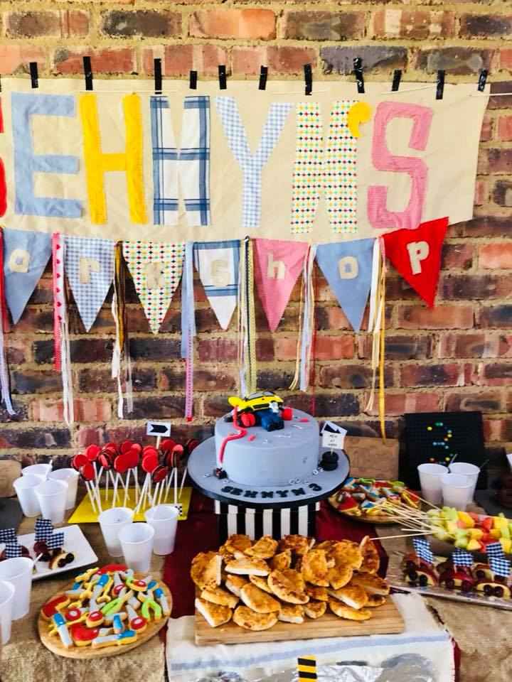 Colorful birthday decorations and treats for a child's celebration.