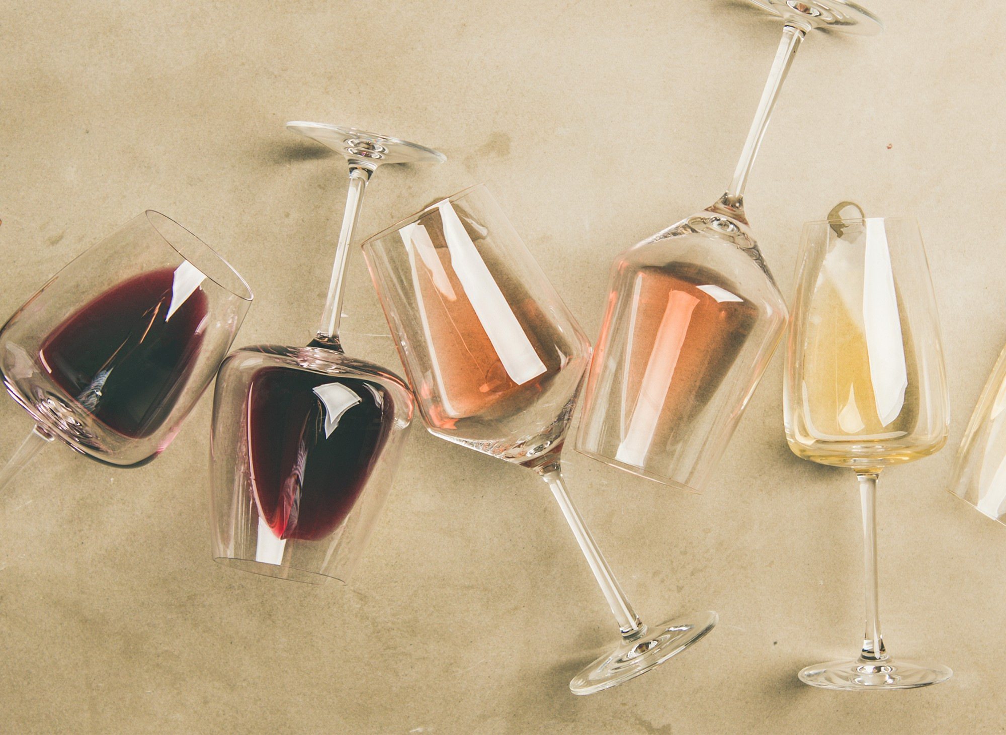 Mixed wine glasses with different beverages