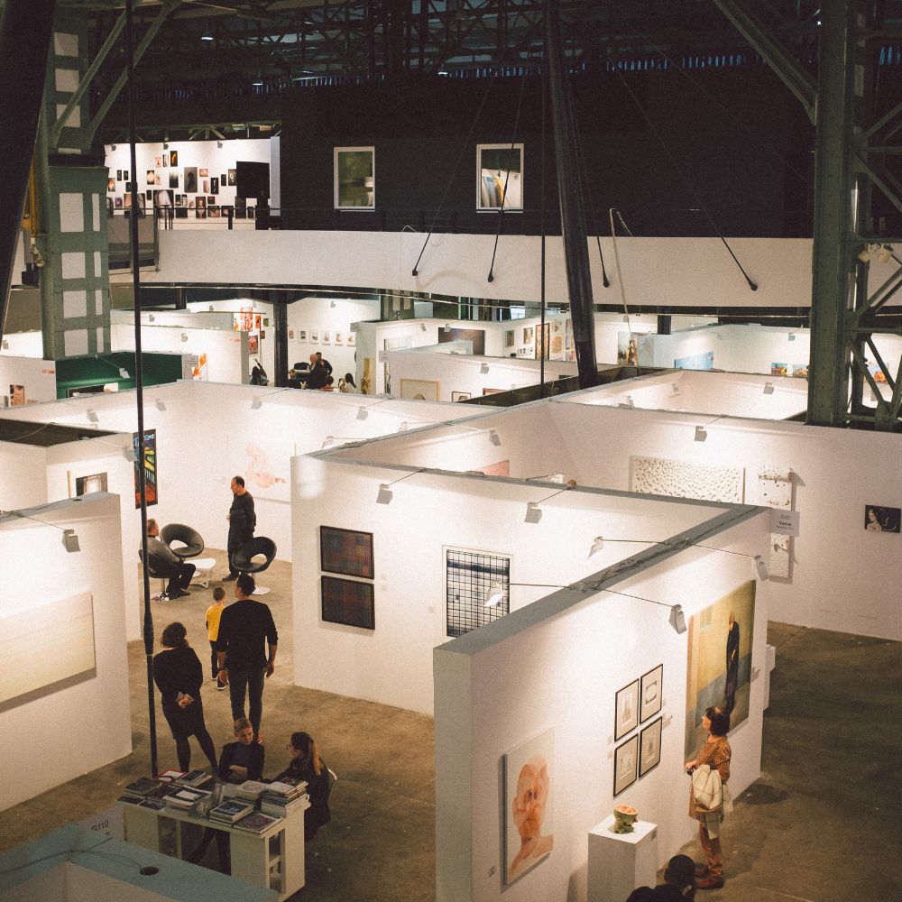 Interior view of an event space with artwork and furniture