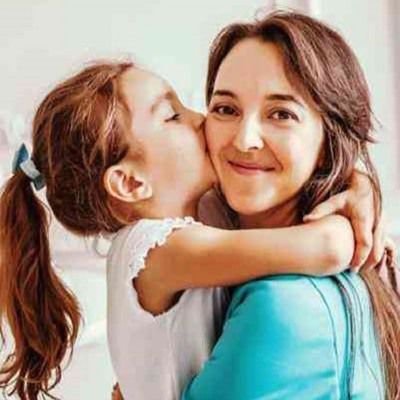 Mother and daughter sharing a loving embrace