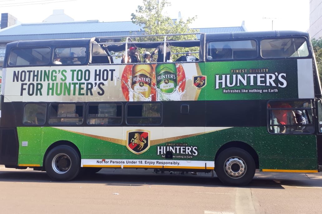 Branded Double Decker Party Bus featuring Hunter's advertisement