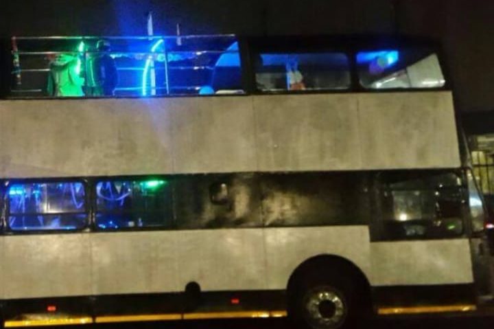 Double Decker Party Bus with vibrant lighting