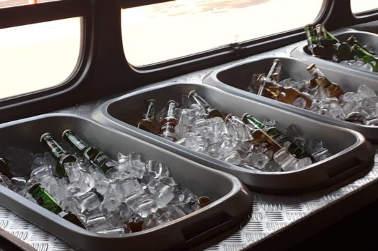 Ice trays filled with bottles of beer