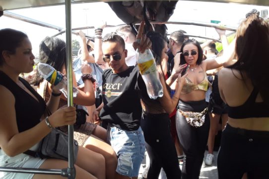 Energetic group enjoying a party bus experience
