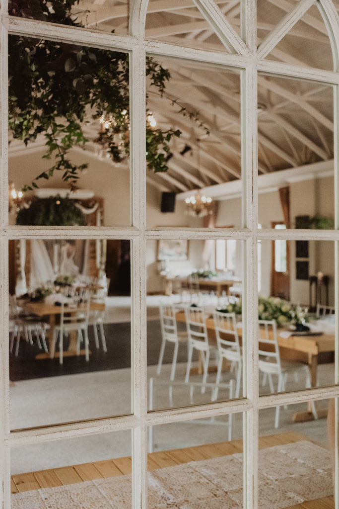 View of decorated reception hall through a window