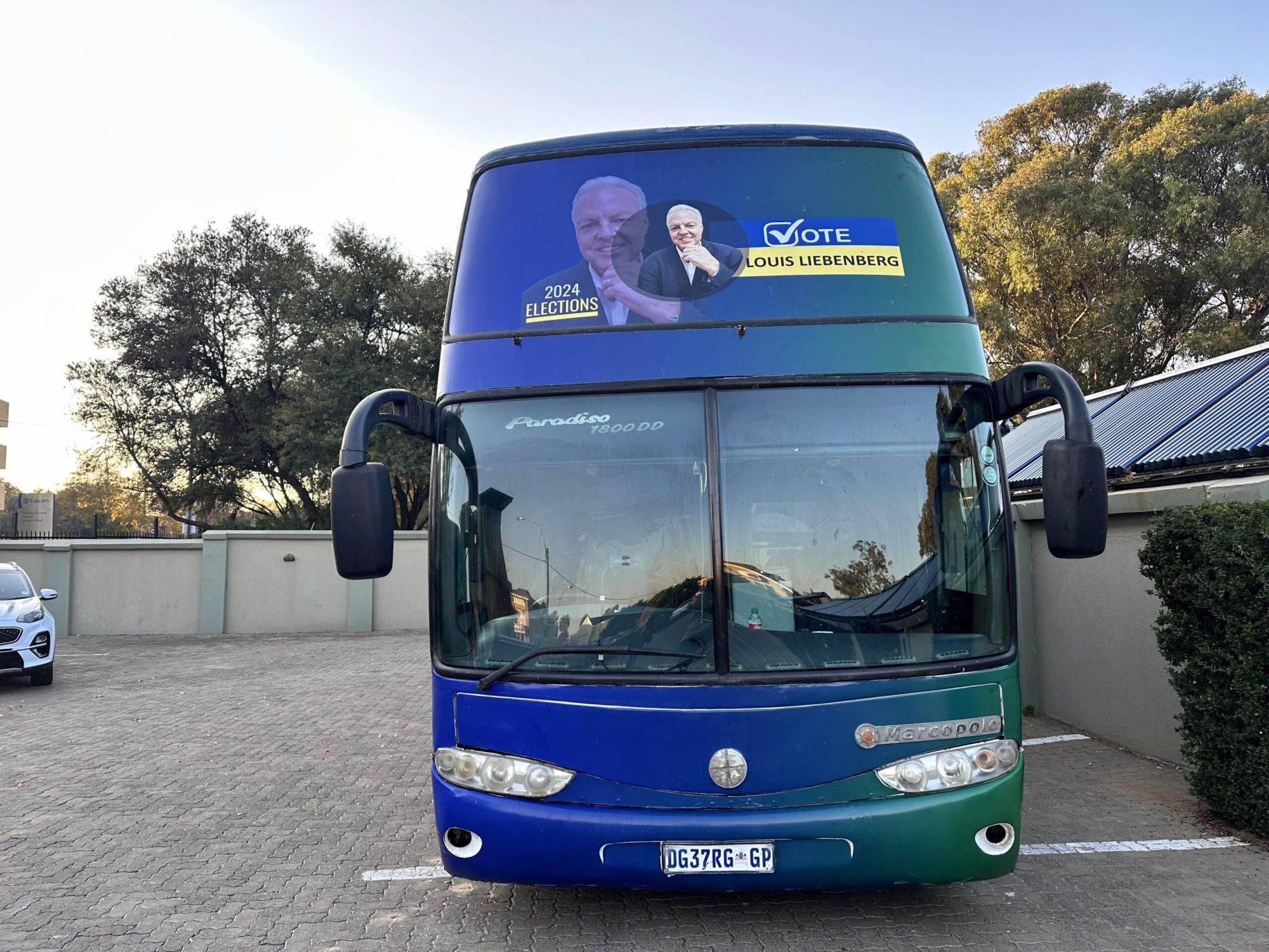 Front view of a branded party bus for the 2024 elections