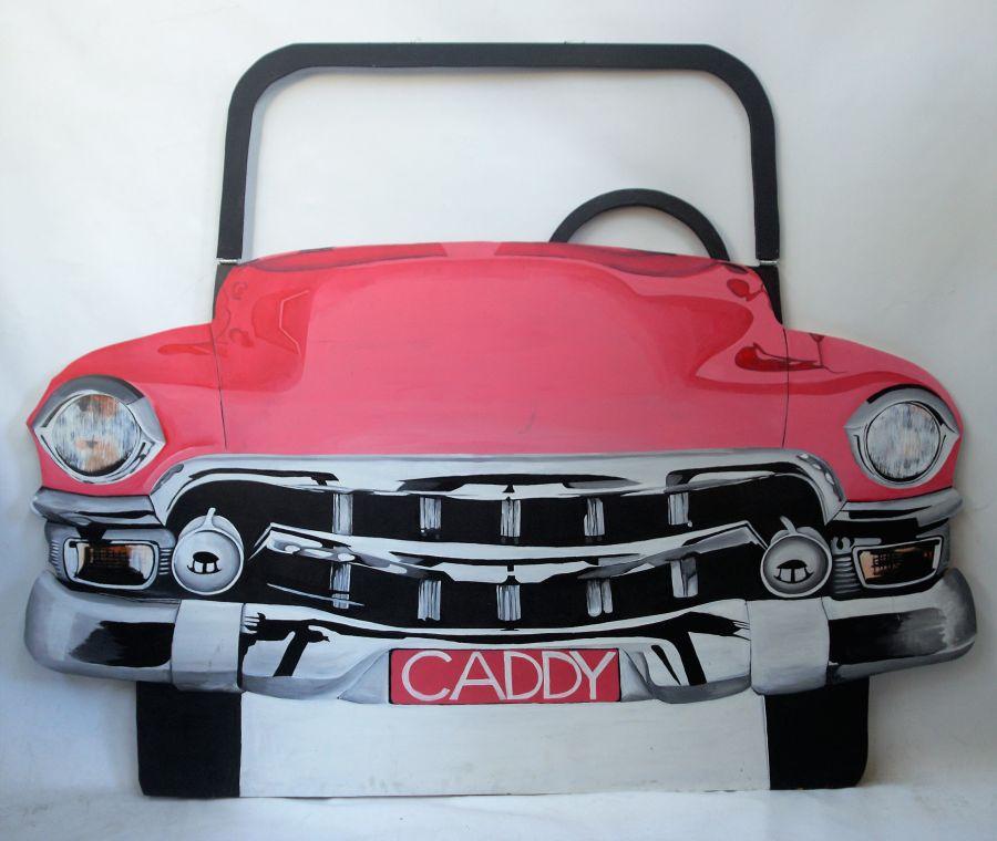 Vintage pink car prop with CADDY label