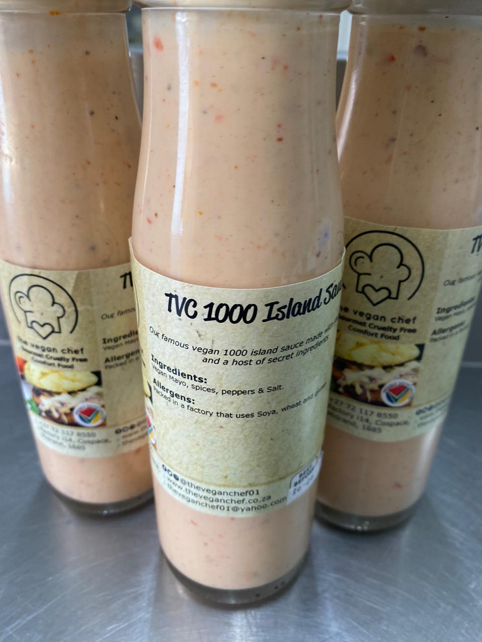Three bottles of 1000 Island vegan sauce on a table