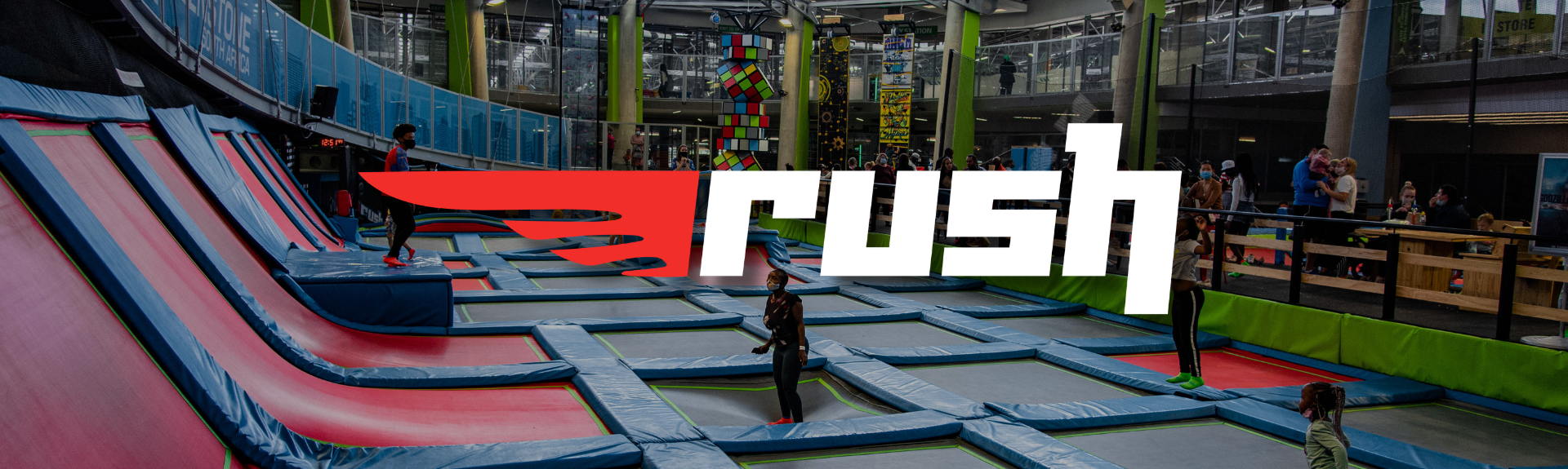 Trampoline play area featuring multiple jump zones at Rush