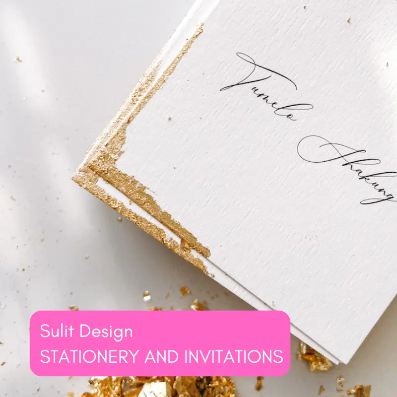 Custom wedding invitation with gold detailing and elegant text