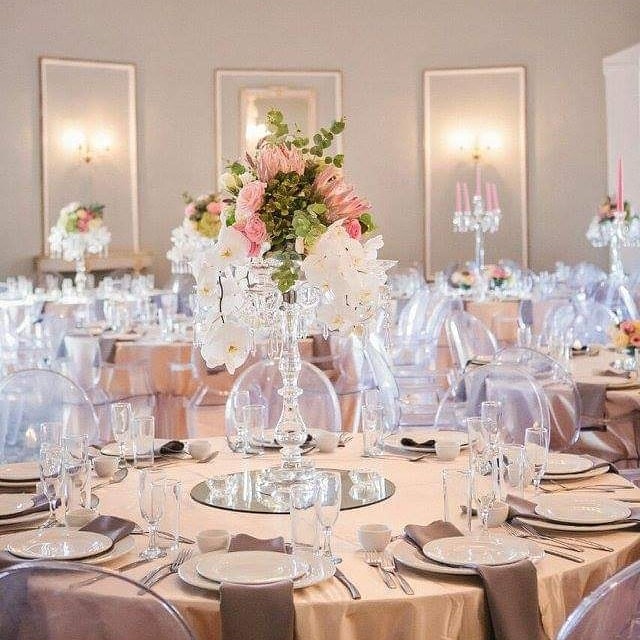 Elegant table setting with floral centerpiece and glassware