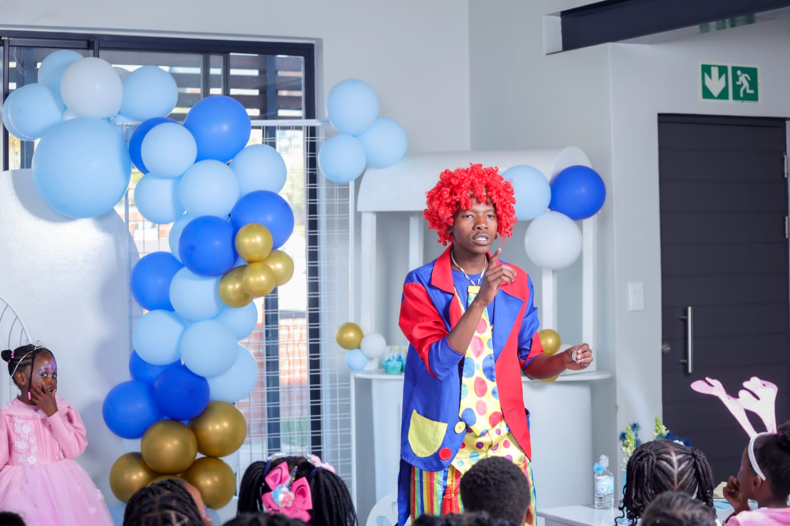 Clown entertaining children at a party