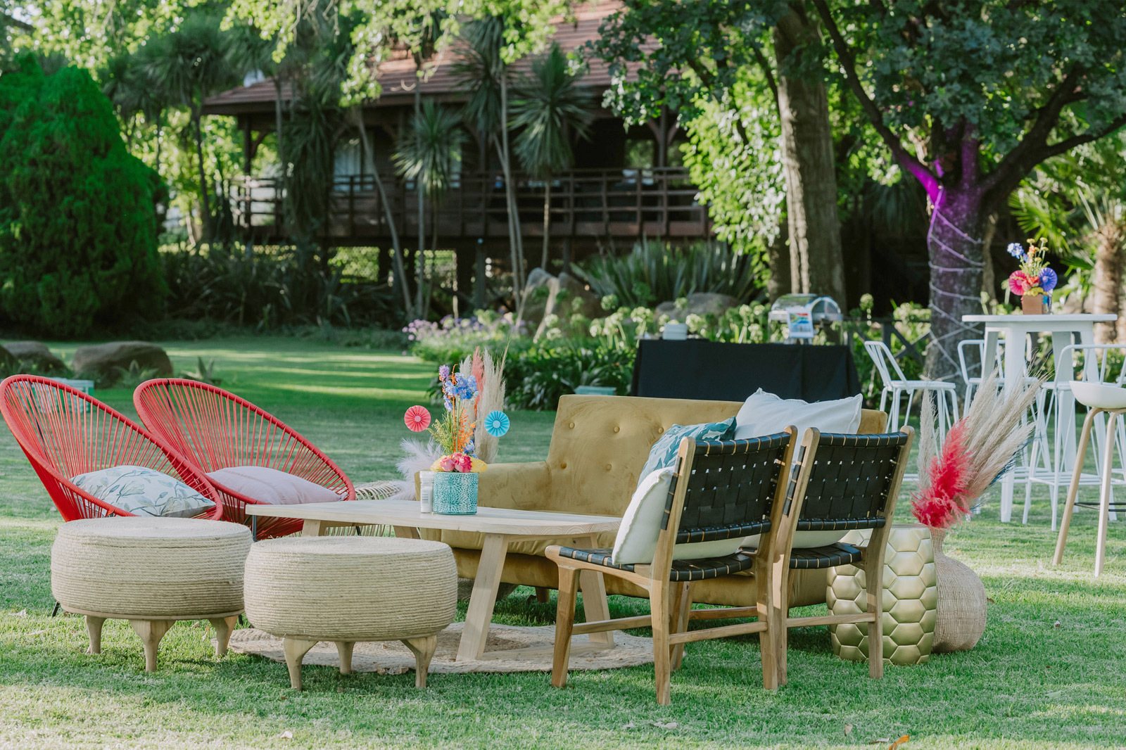 Outdoor lounge setup with colorful chairs and stylish seating.