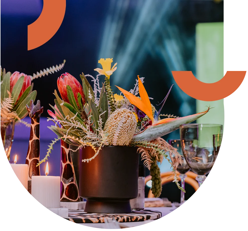Colourful floral arrangement in a black pot