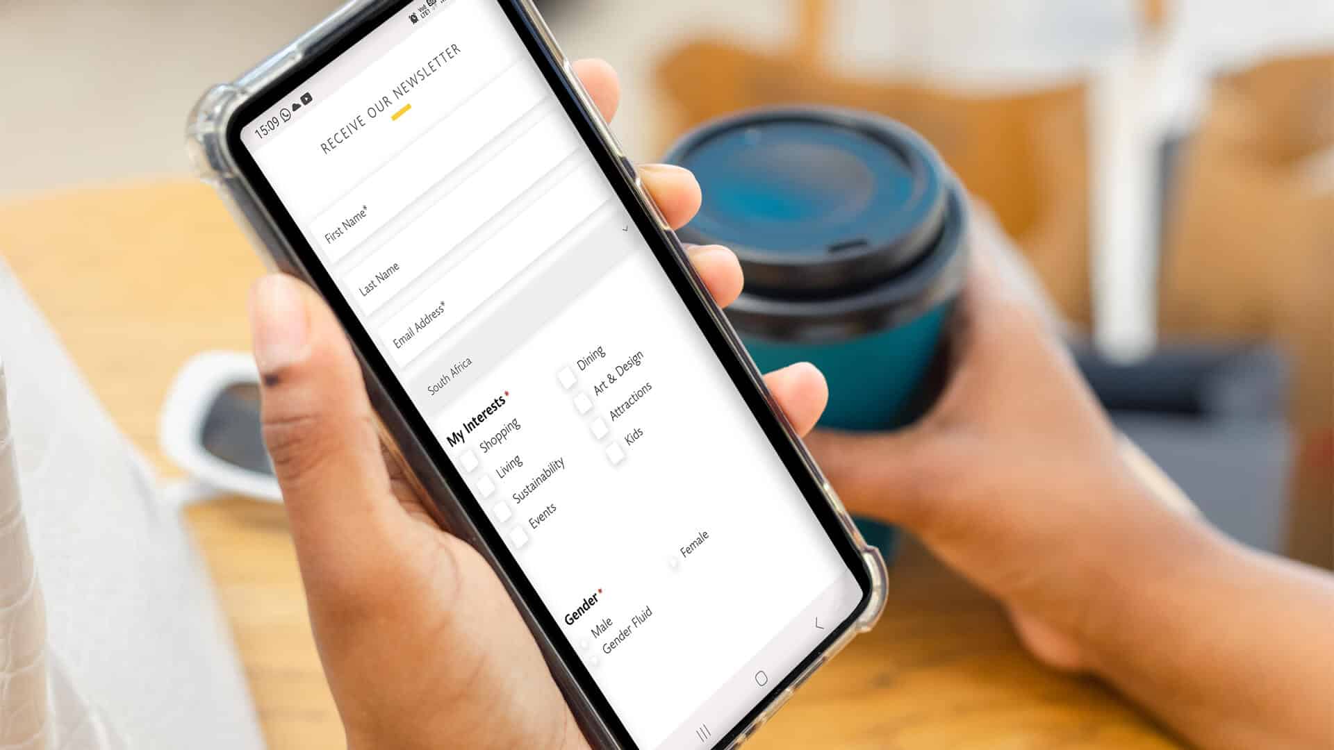 Mobile phone displaying newsletter subscription form