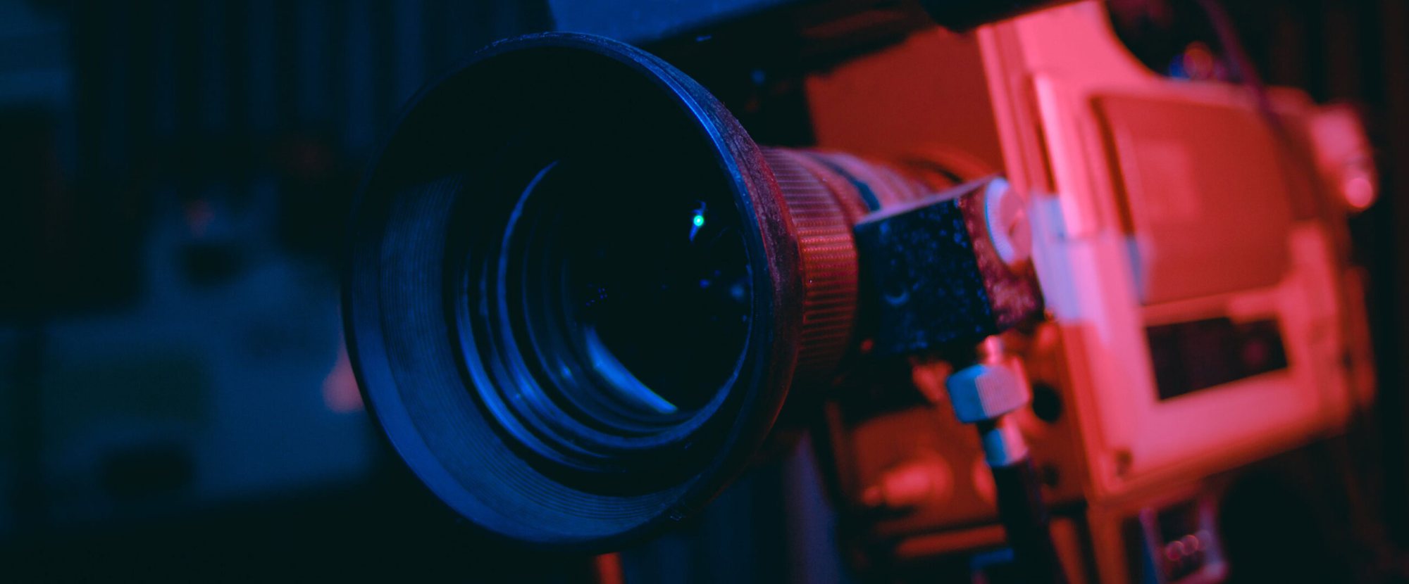 Close-up of a professional camera lens set up for live streaming