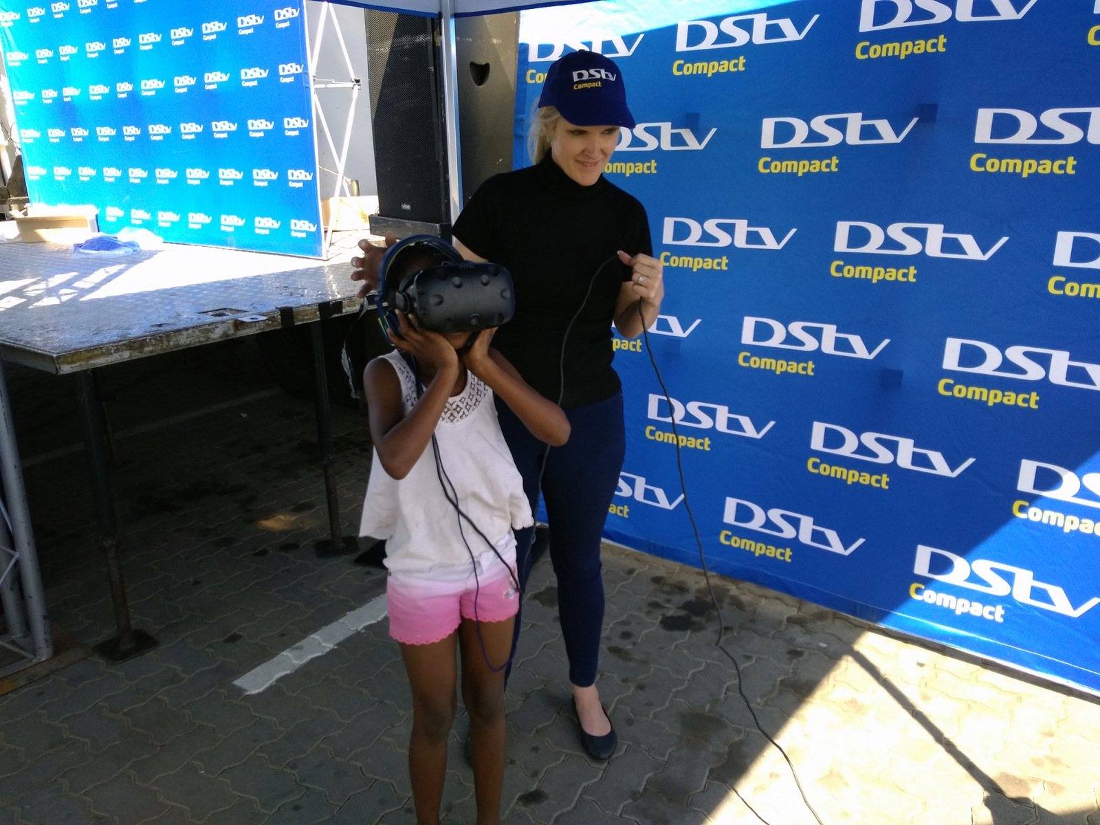Child using VR headset at a branded event