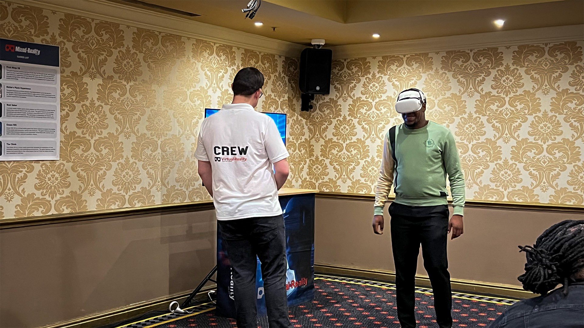 Participants engaged in a virtual reality experience at an event.