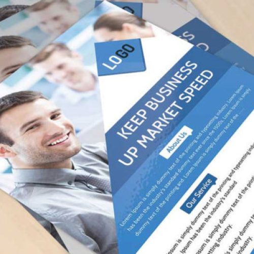 Close-up of printed professional business flyers with logo