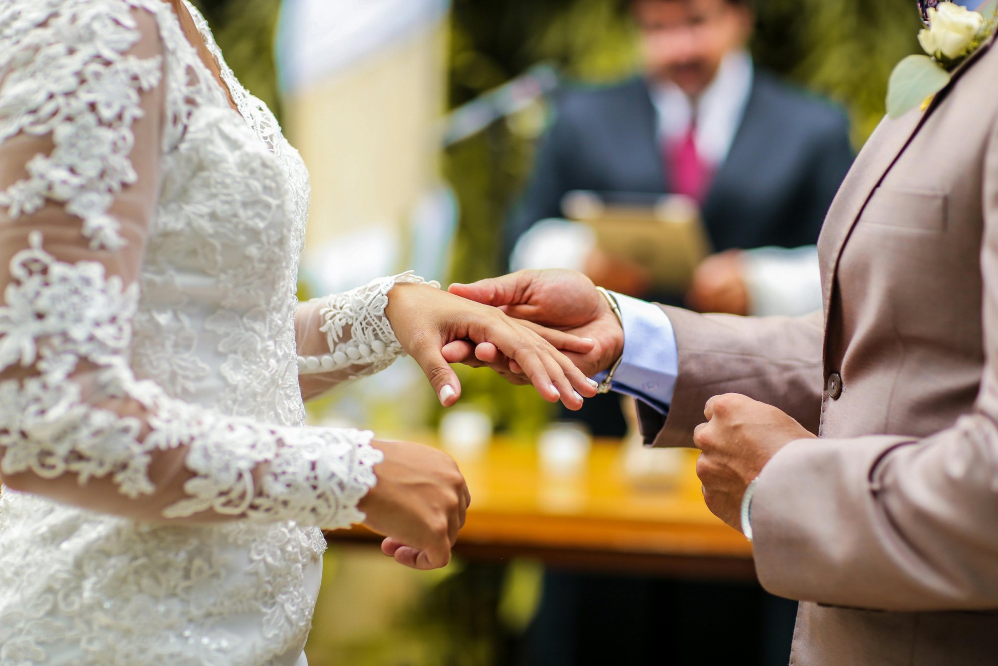 Bride and groom exchanging rings during the wedding ceremony