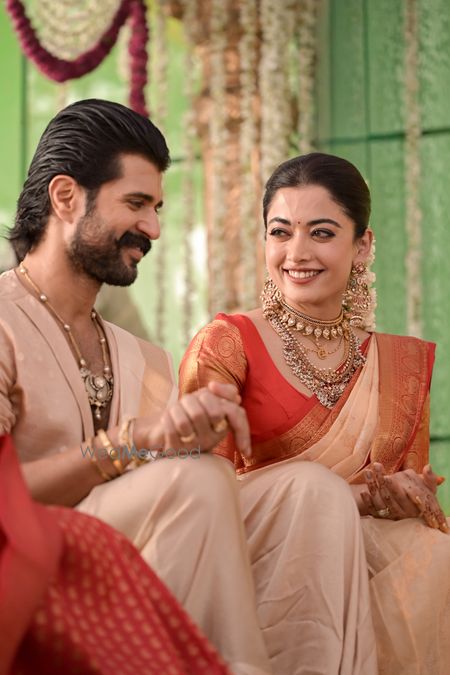 Couple sharing a joyful moment during a wedding ceremony