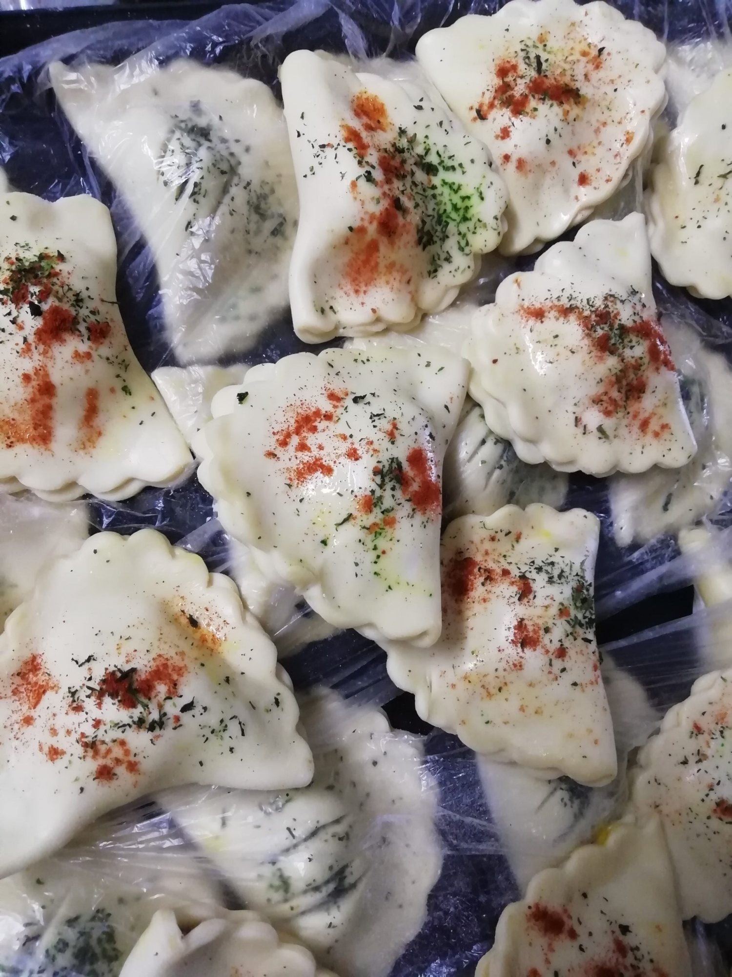 Platter of freshly prepared halaal pastries seasoned with spices.
