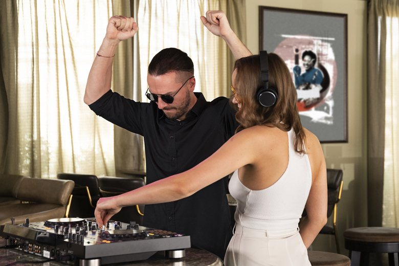 DJ engaging with a guest at an event