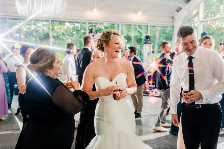 Group of guests enjoying a wedding reception
